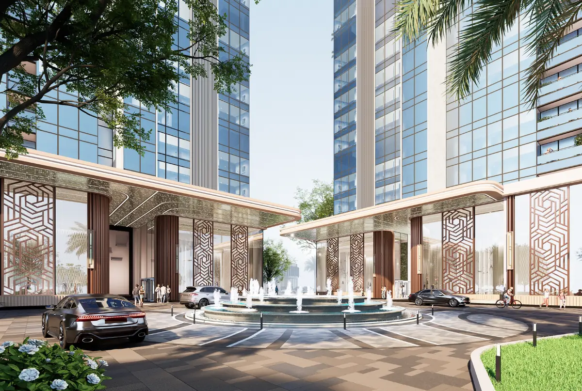 Arrival court with covered drop off and water feature at the base of the towers